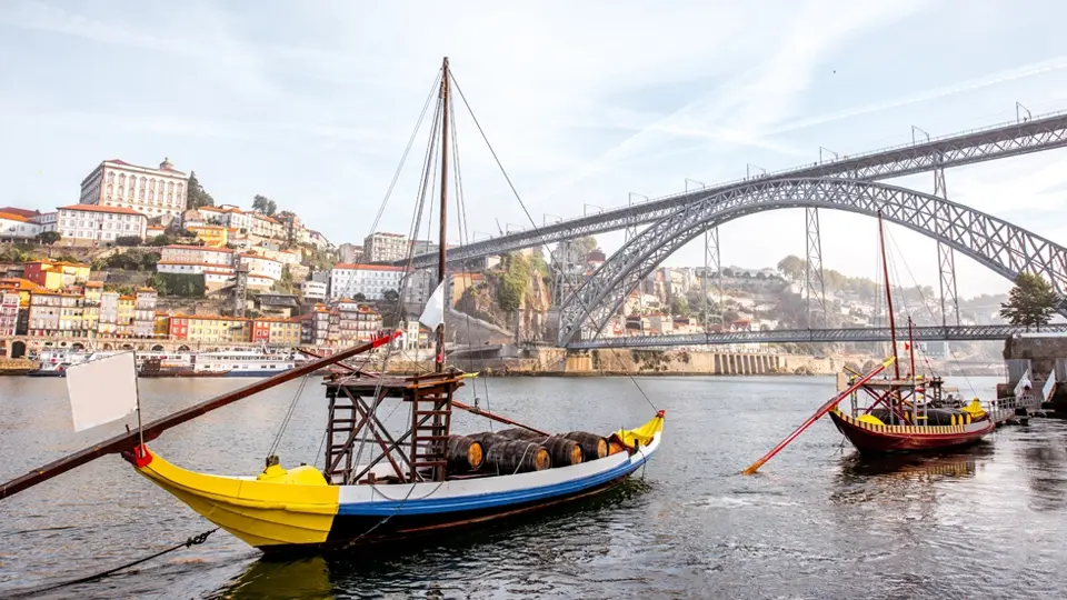 Bridge and boats in Porto (Portugal)