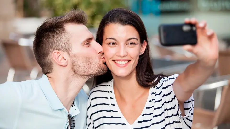 Happy couple taking a selfie